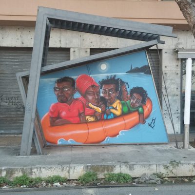 Immagine di uno dei murales di Messina con immigrati